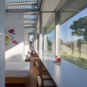 With 3 Kids, 2 Dogs and the Jungle / Osamu Morishita Architect & Associates With 3 Kids, 2 Dogs and the Jungle / Osamu Morishita Architect & Associates © Hahakura Photo Office