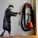 French Artist Levalet Inks Imaginary Scenes onto Parisian Buildings French Artist Levalet Inks Imaginary Scenes onto Parisian Buildings Energy drink. Image © Levalet