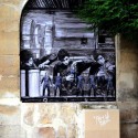 French Artist Levalet Inks Imaginary Scenes onto Parisian Buildings French Artist Levalet Inks Imaginary Scenes onto Parisian Buildings The factory. Image © Levalet
