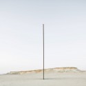 Richard Serra's East-West/West-East Rises in the Qatari Desert “East-West/West-East” / Richard Serra. Image © Nelson Garrido
