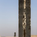 Richard Serra's East-West/West-East Rises in the Qatari Desert “East-West/West-East” / Richard Serra. Image © Nelson Garrido