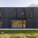 Library, Game Library & Municipality Administration in Spiez / bauzeit architekten © Yves André