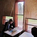 Full Scale Studio Completes Rolling House in Sweden Hinged tables inside the Atto. Image Courtesy of Full Scale Studio