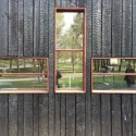 Full Scale Studio Completes Rolling House in Sweden The Atto's burnt wood facade. Image Courtesy of Full Scale Studio