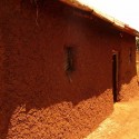 Why I Created a Database to Document African Vernacular Architecture Rwanda - a recently re-plastered wall. The exposure and unfinsished quality of the plastering means that it requires repeated maintenance. Image © Philip Poduie
