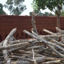 Why I Created a Database to Document African Vernacular Architecture Malawi - a brick kiln in the background, with the wood required to burn them in the foreground. Image © Jon Sojkowski via Malawi Architecture