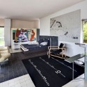 Images from the Much-Anticipated Restoration of Eileen Gray's E-1027 Villa E-1027 - The main room with furniture and tapestry by Eileen Gray, with a mural by Le Corbusier. Image © Manuel Bougot - FLC/ADAGP